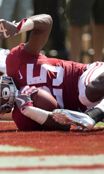 Bama running game rolling along with Harris, freshmen